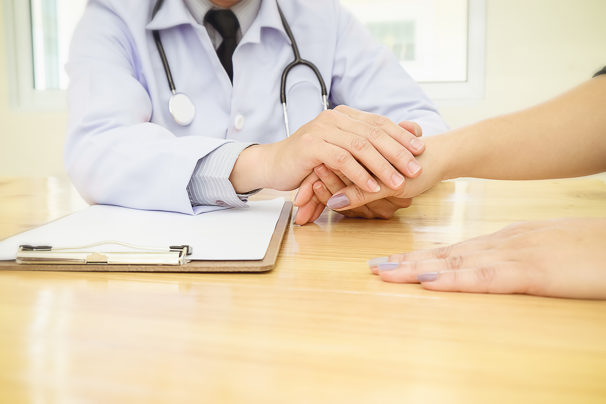 Close up of Professional Doctor and Patient 